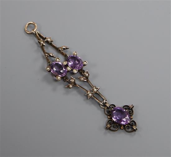 An Edwardian yellow metal, amethyst and seed pearl set drop pendant, 7.6cm.
